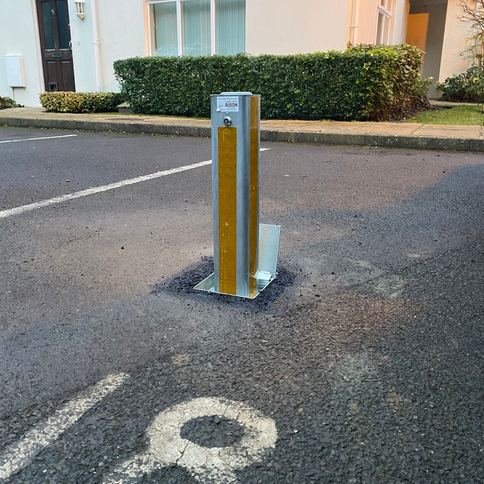 Bison Products Ramco 100 with hi vis foil tape 100mm x 100mm 540mm high heavy duty car van motorhome driveway security bollard facing left