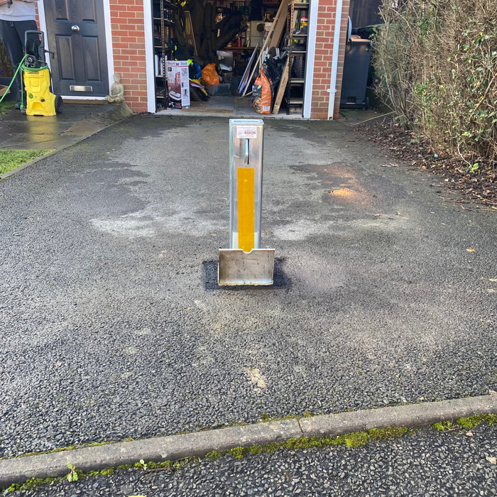 Bison Products Ramco 100 with hi vis foil tape 100mm x 100mm 540mm high heavy duty car van motorhome driveway security bollard facing left