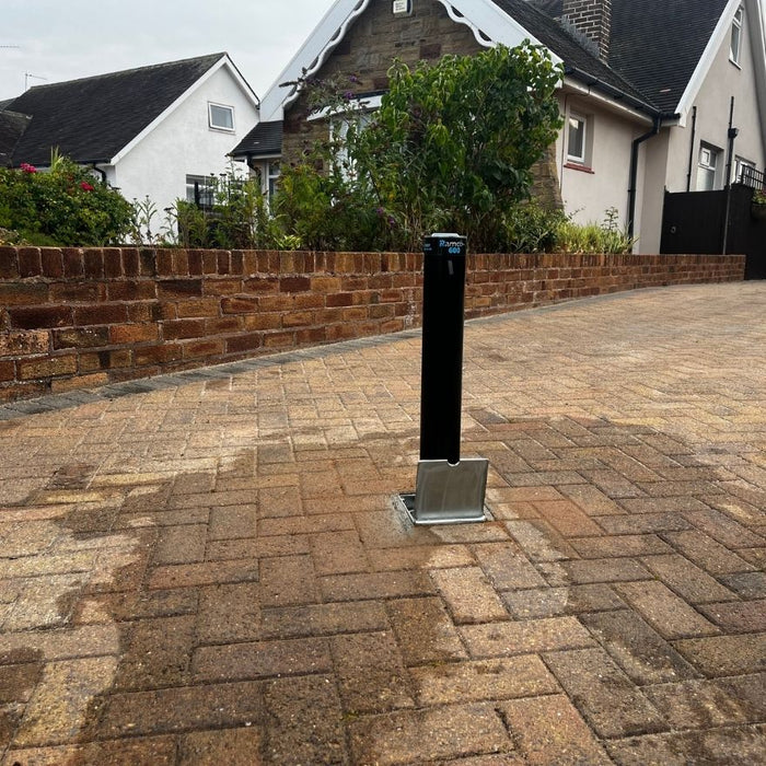 Ramco 600 telescopic driveway security bollard in block paved.