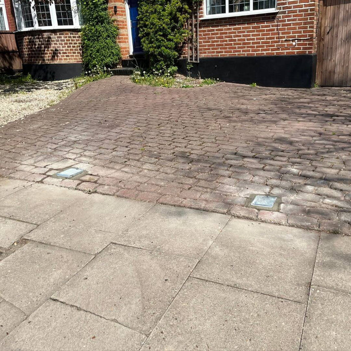 Bison Products Ramco 600 telescopic car security bollard powder coated and 600mm high installed in printed concrete driveway