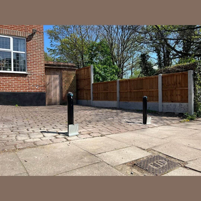 Bison Products Ramco 600 telescopic car security bollard powder coated and 600mm high installed in printed concrete driveway