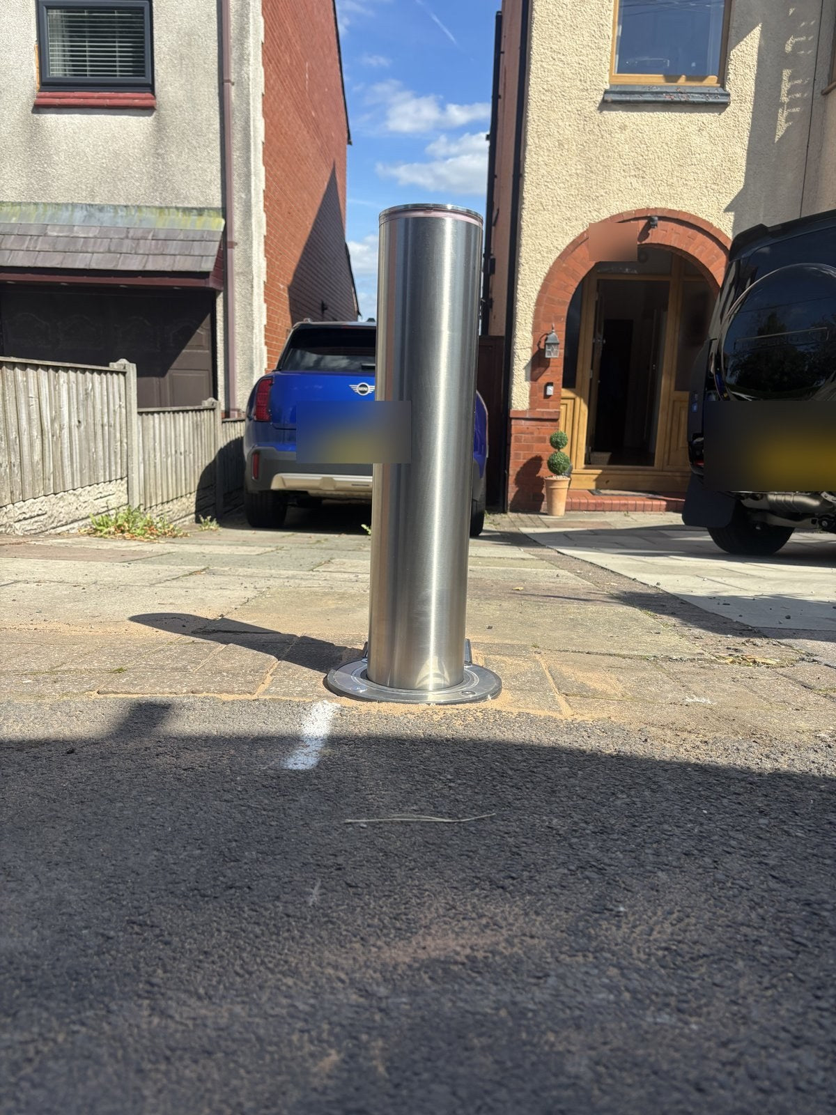 Ramco AutoGuard automatic bollard installed at a driveway entrance in Upholland, Lancashire