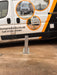 Security bollard installed in concrete driveway to protect a motorhome. 