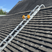Industrial Roof Hook on roof - Showing wheels and clamps in use