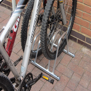 2 bike dual height flat top bike rack, floor mounted and ideal for bikes with disc brakes .