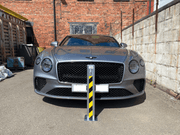 Bison Products Ramco Driveway Security Bollards Installation in front of a Bentley