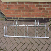 Bison products 5 bike dual height bike rack for bikes with disc brakes with a maximum tyre width of 55mm.