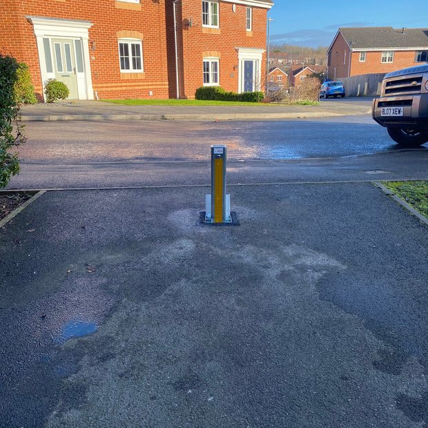 Bison Products Ramco 100 with hi vis foil tape 100mm x 100mm 540mm high heavy duty car van motorhome driveway security bollard facing left
