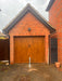 Bison Products Ramco 70 Driveway Security Post Installed for a small SUV and city car infant of garage.