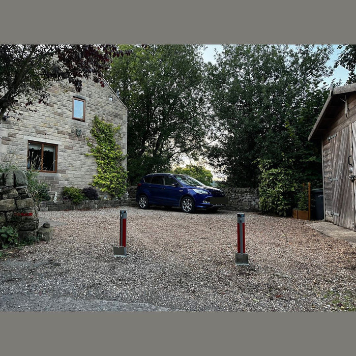 Bison Products Ramco 600 telescopic driveway bollard in grey with integrated anti drill lock. Installed in Matlock Derbyshire England.