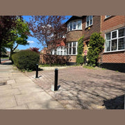 Bison Products Ramco 600 telescopic car security bollard powder coated and 600mm high installed in printed concrete driveway