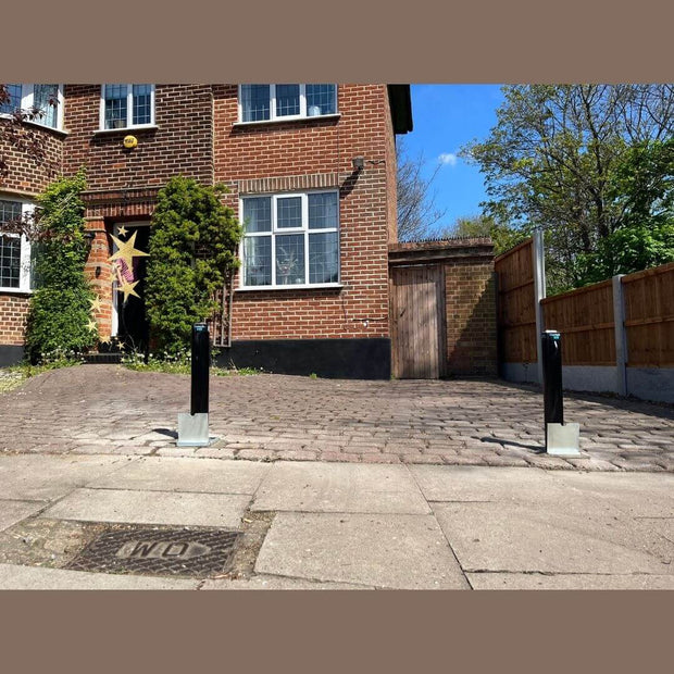 Bison Products Ramco 600 telescopic car security bollard powder coated and 600mm high installed in printed concrete driveway