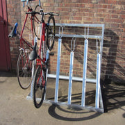 Semi vertical floor mounted bike storage ideal for outside bike sheds.